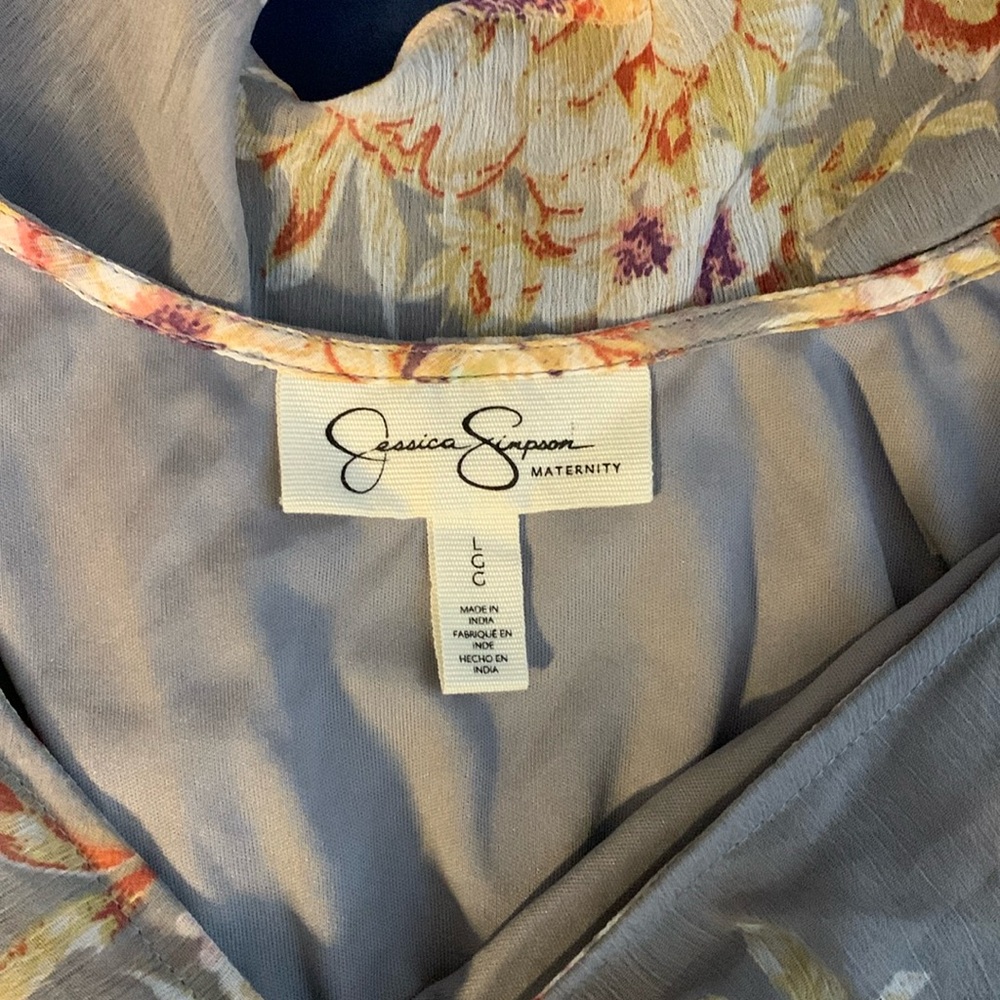 A sophisticated maternity maxi dress.